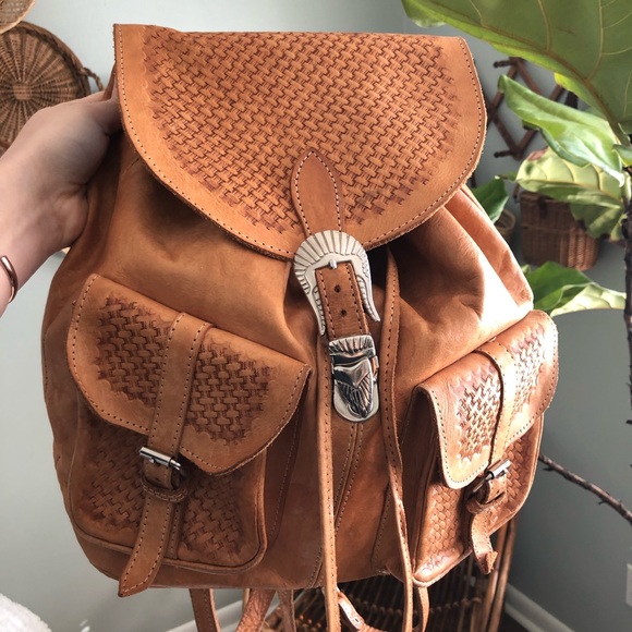 tooled leather backpack